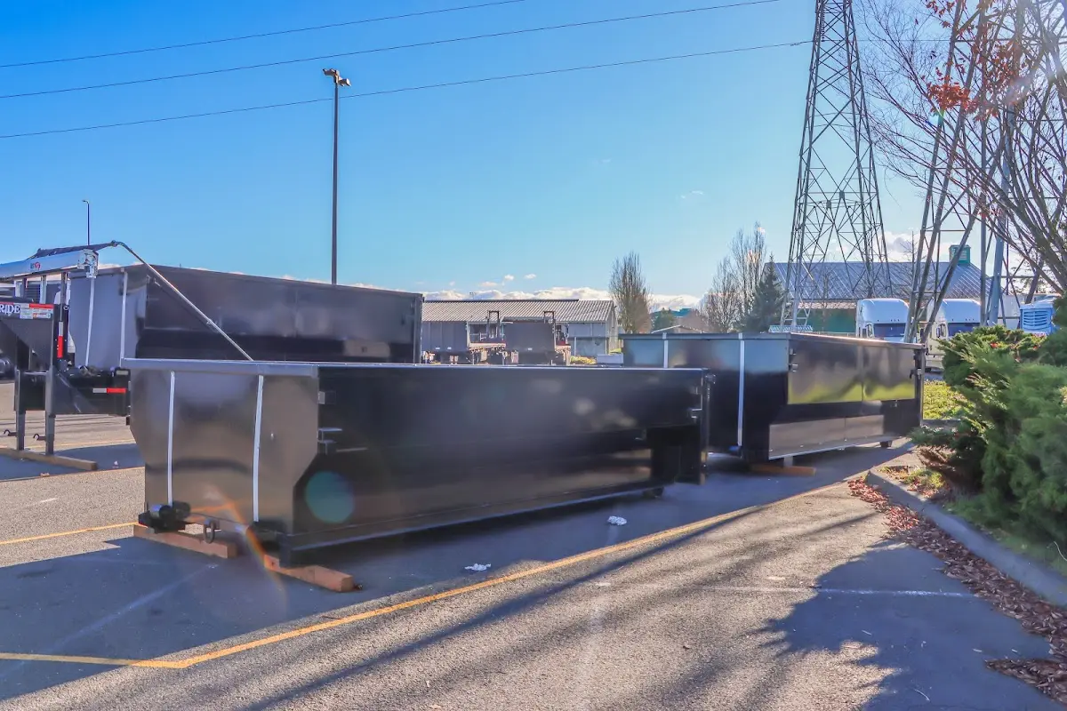 Roll-off dumpster ready for waste disposal at job site for 2 Yard Dumpster Rental in Clarksville